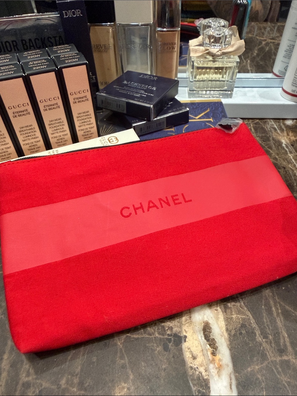 CHANEL Red Logo Zip Pouch